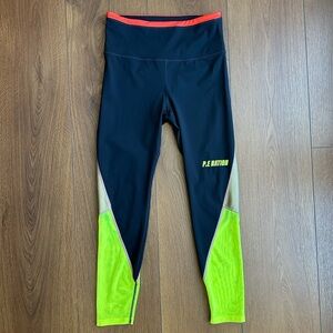 P.E Nation Black/Blue Leggings with Neon Yellow and Orange Accents